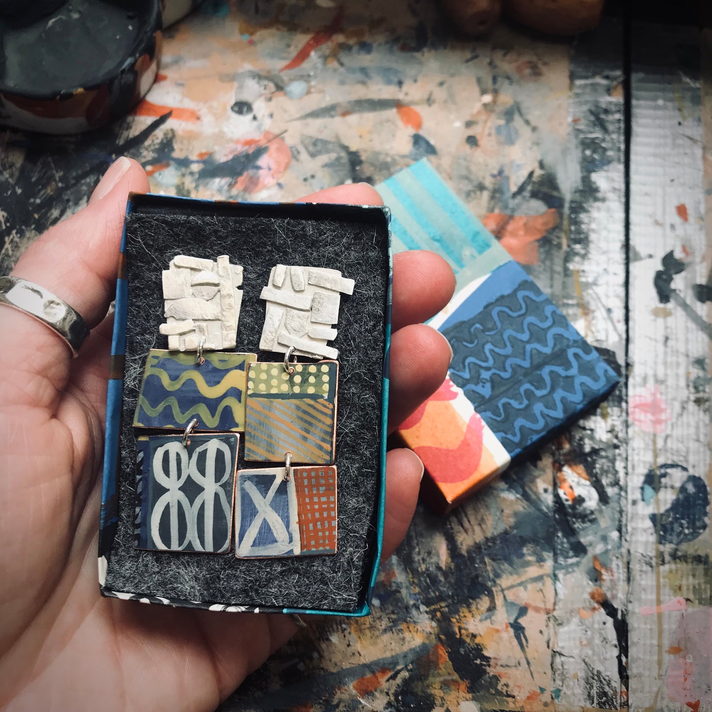 the well of inspiration ON THE CUSP earrings with yellow waves