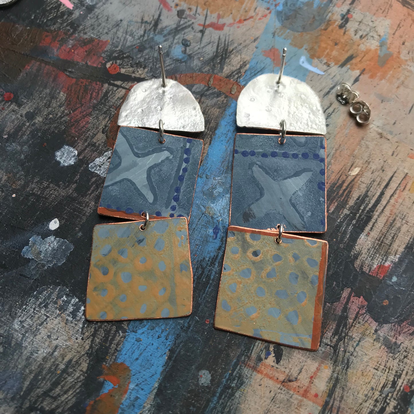 the death defying ON THE CUSP earrings with red & mustard grids