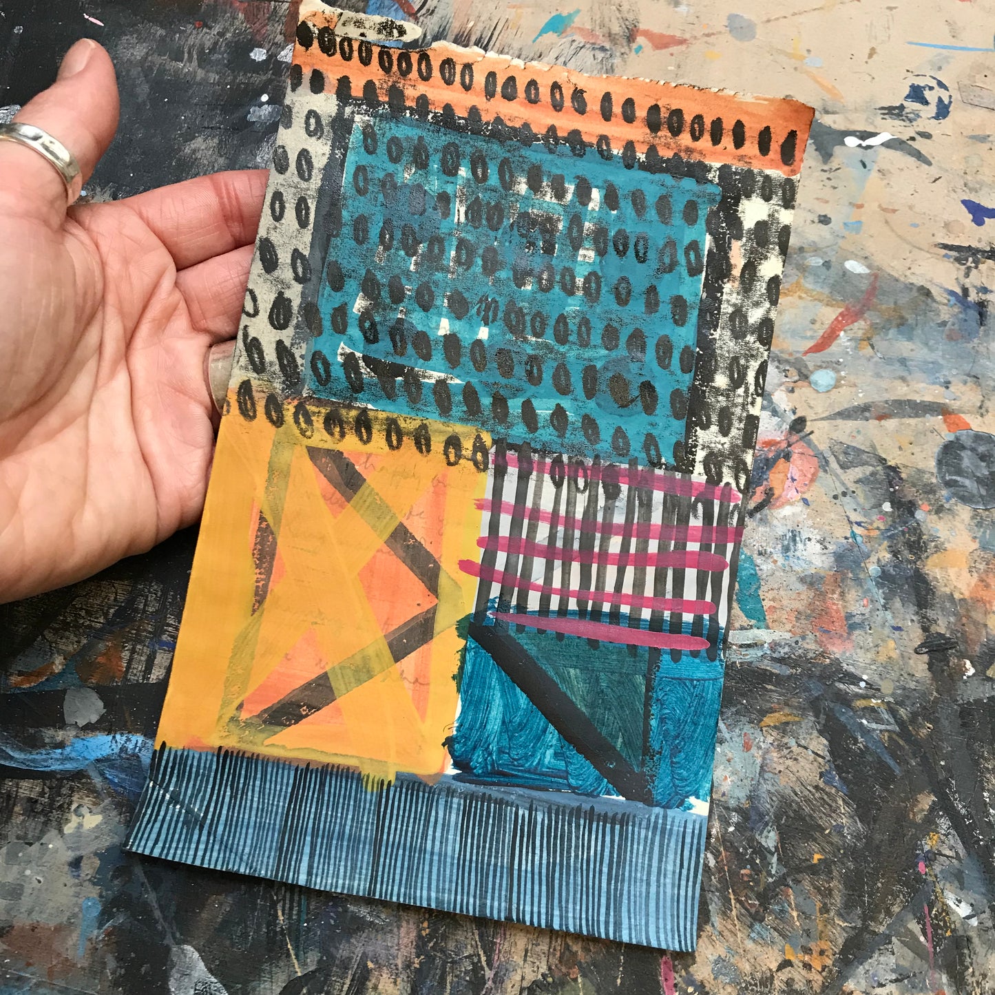 Impetus, mixed media on salvaged notebook page