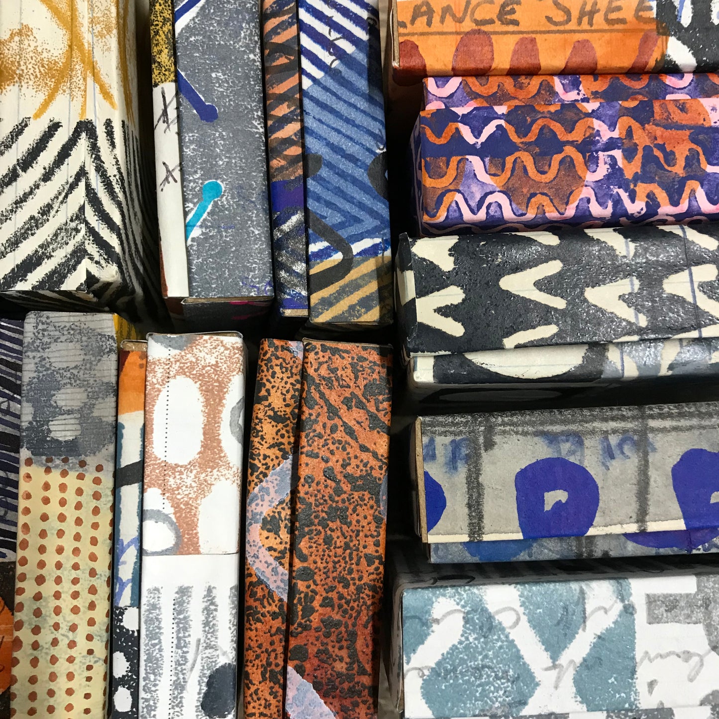 black & orange playful painterly earrings