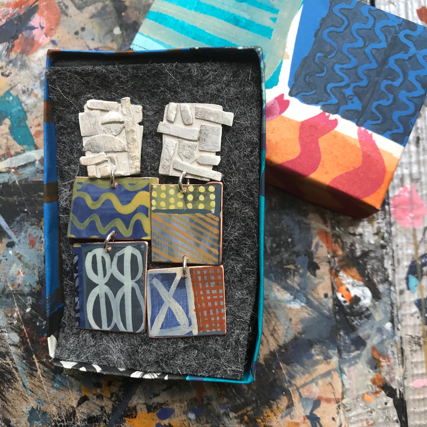 the well of inspiration ON THE CUSP earrings with yellow waves