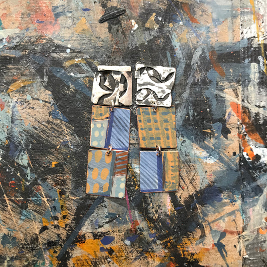 the raw collaged ON THE CUSP earrings with blue stripes