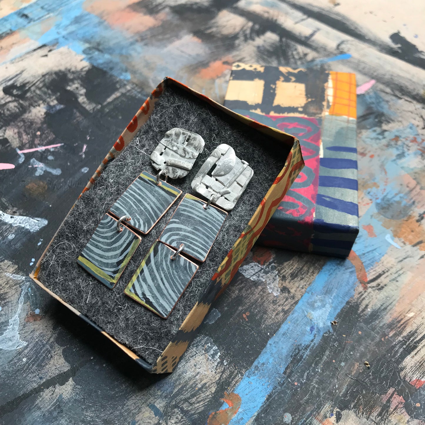 the concentric & collaged ON THE CUSP earrings