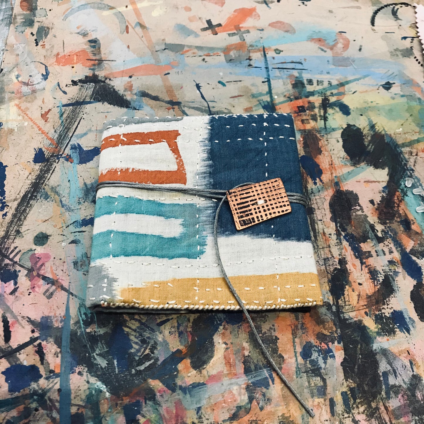 Hand stitched and painted pouch