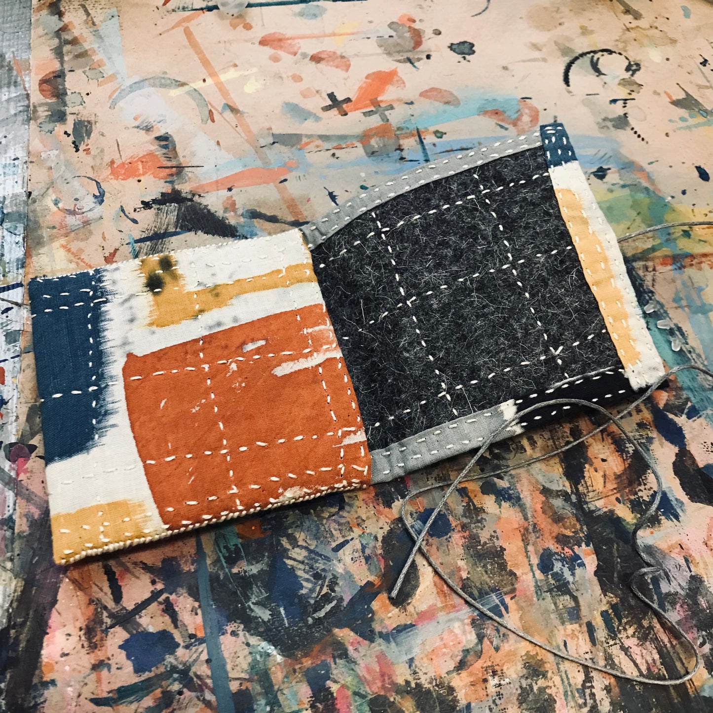 Hand stitched and painted pouch