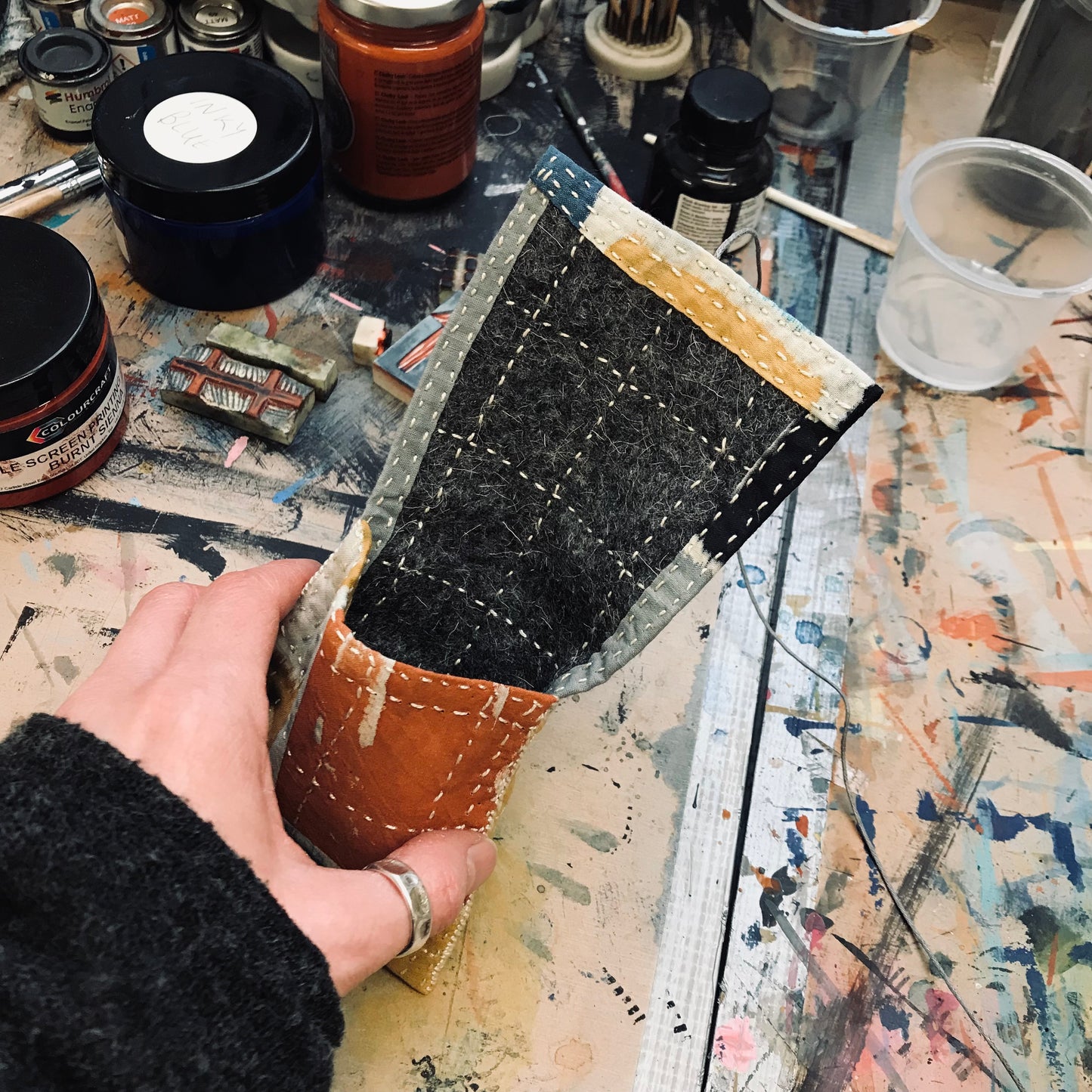 Hand stitched and painted pouch
