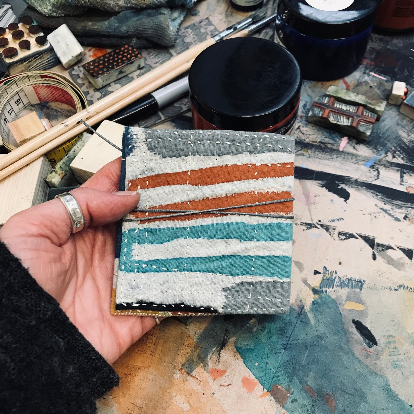 Hand stitched and painted pouch