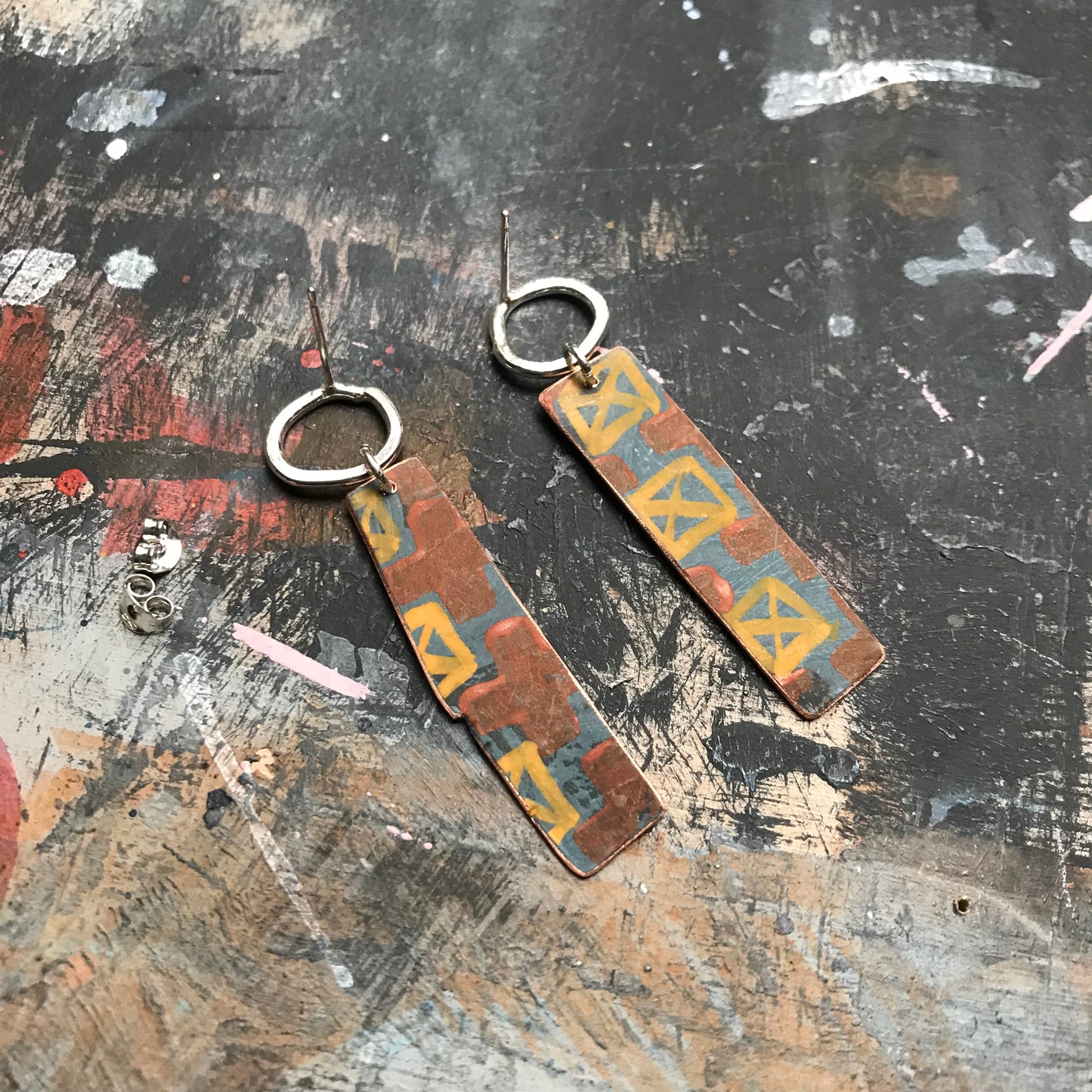 the DELIBERATELY UNRAVELING earrings