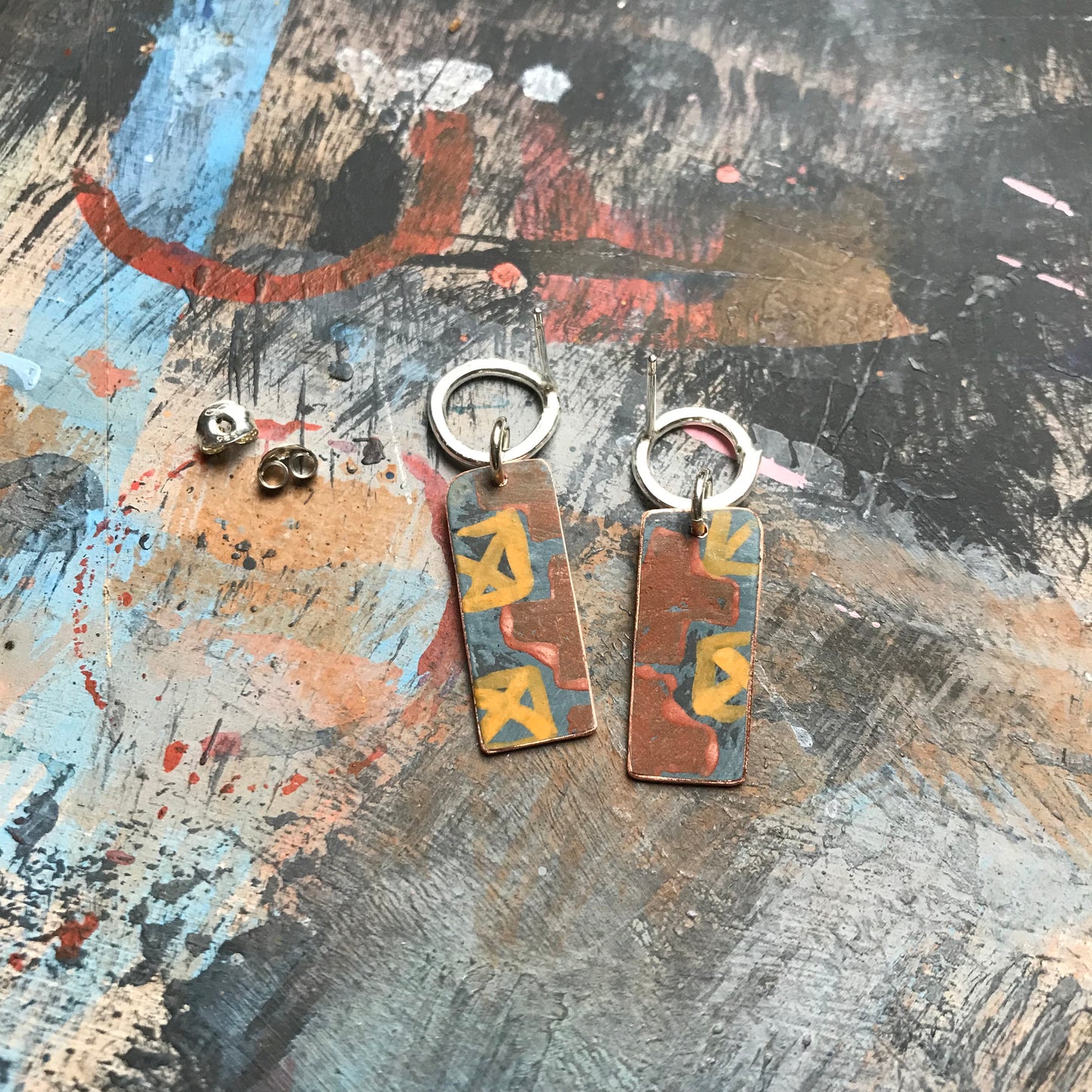 the JUST BECAUSE earrings