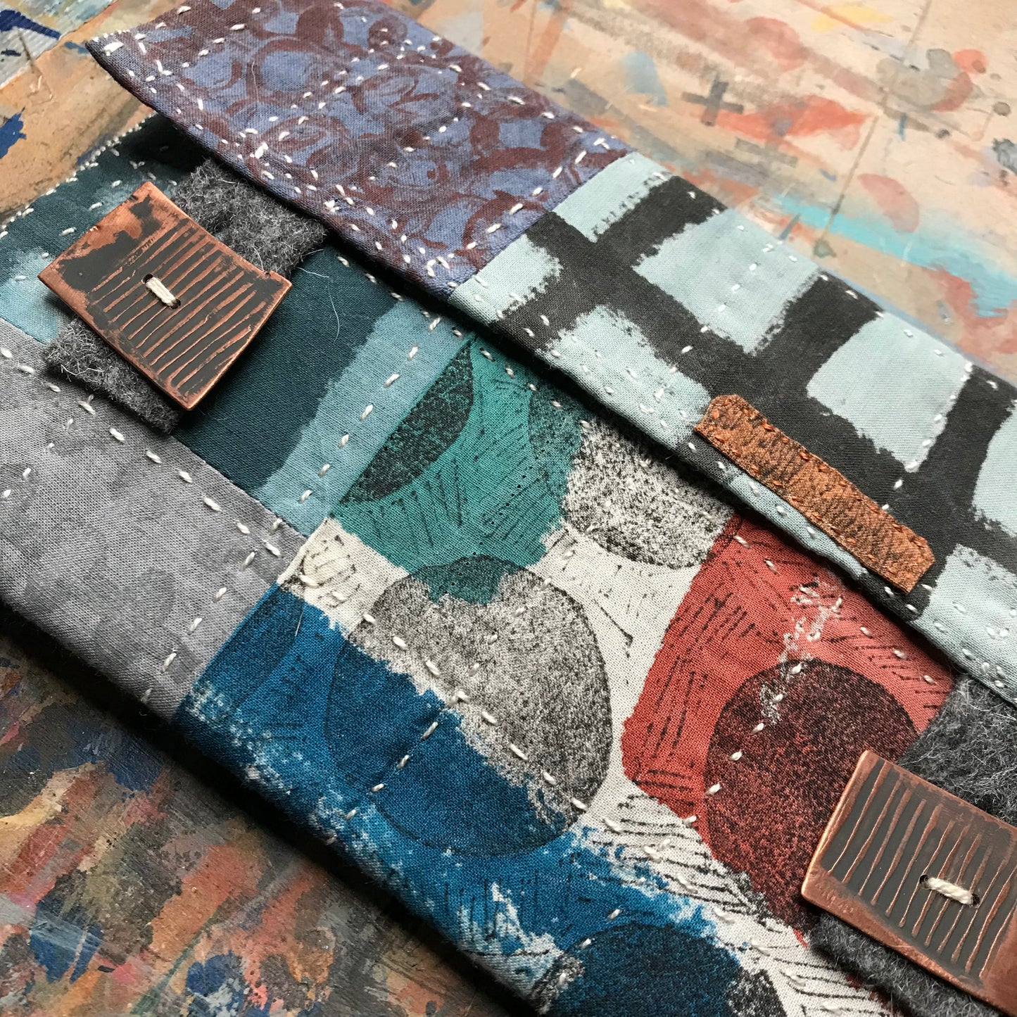 the SOFT PATCHWORK pouch with spots and grids