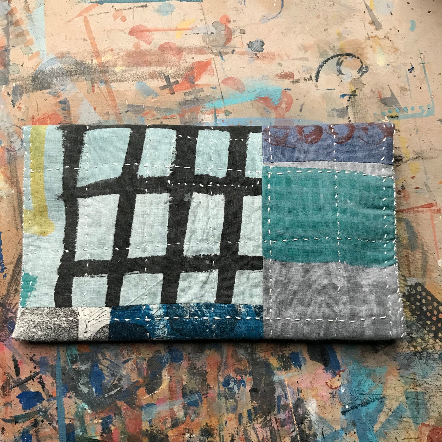the SOFT PATCHWORK pouch with spots and grids