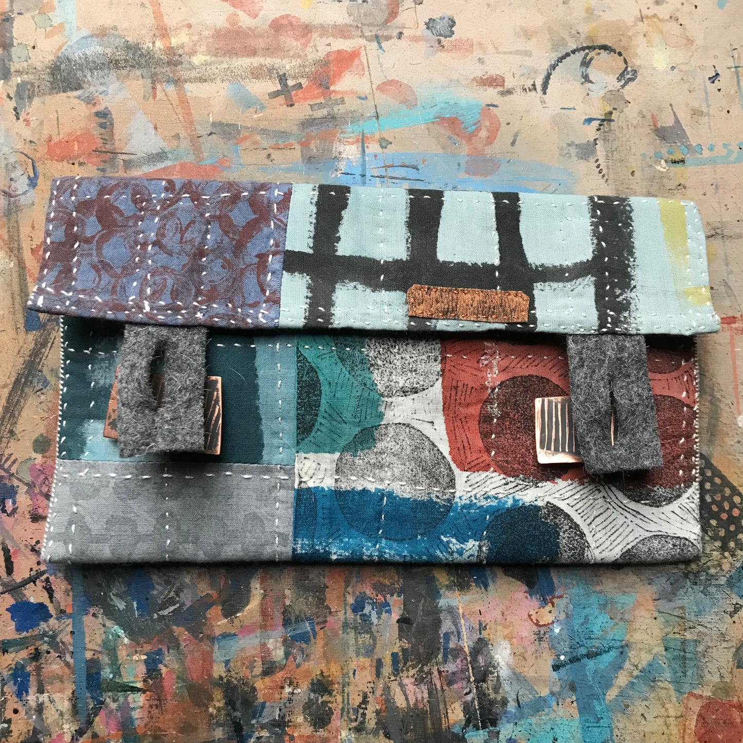 the SOFT PATCHWORK pouch with spots and grids