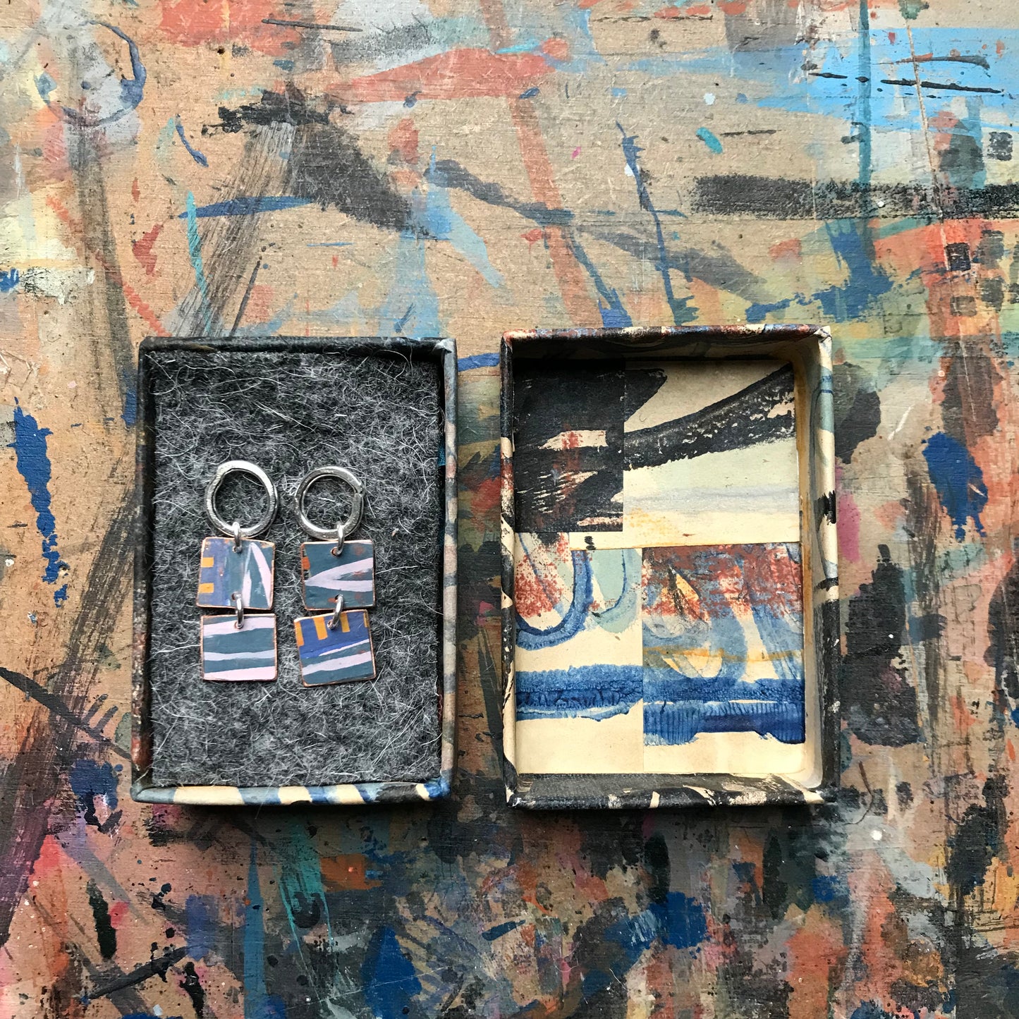 the MEASURED UNFURLING earrings