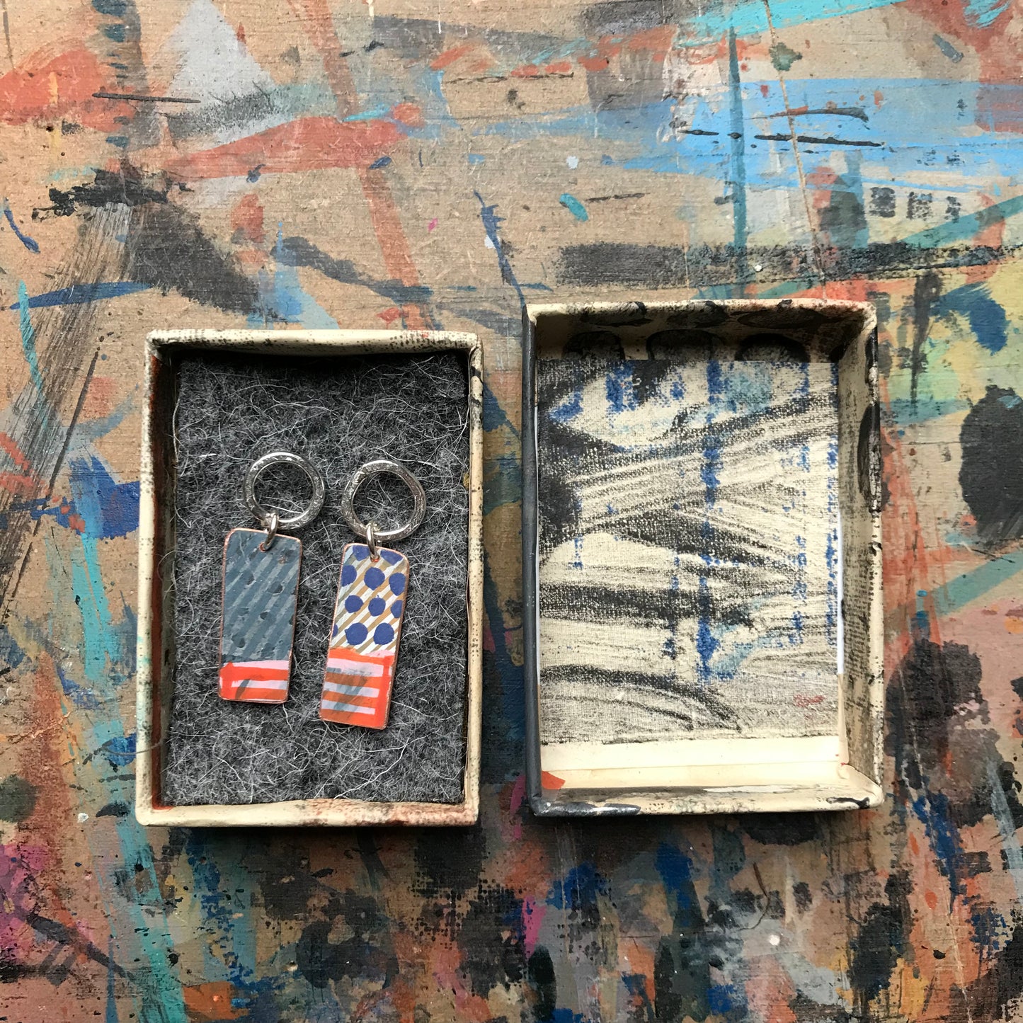 the JUST BECAUSE earrings
