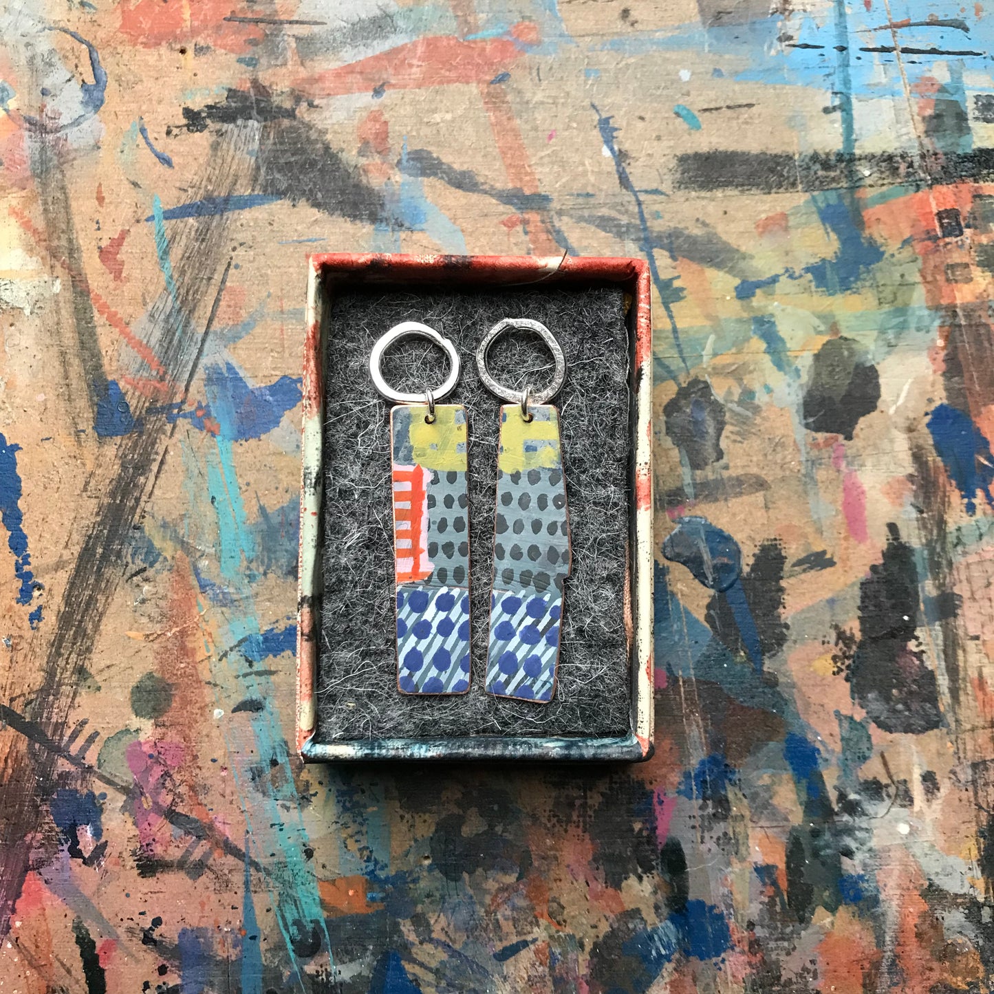 the DELIBERATELY UNRAVELING earrings