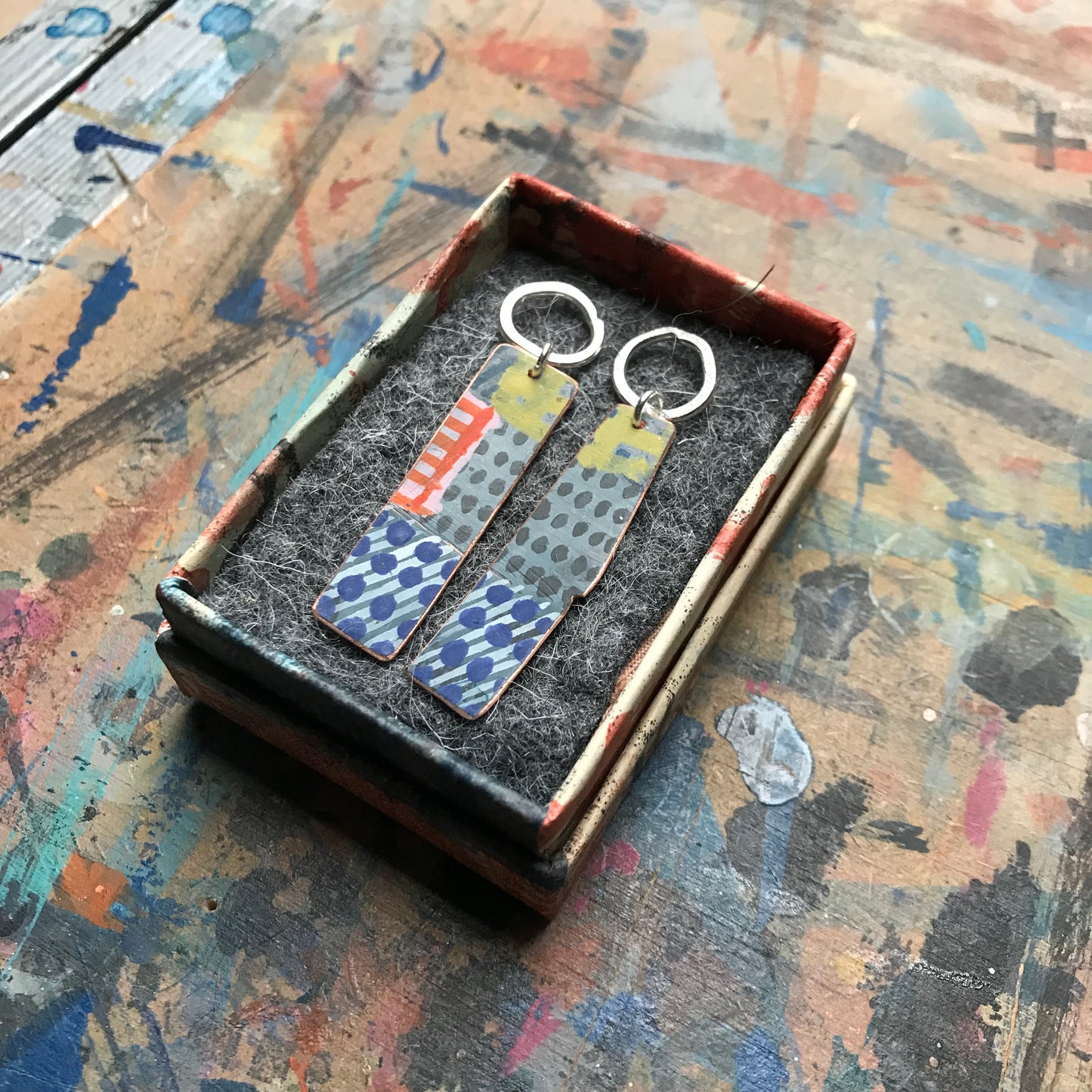 the DELIBERATELY UNRAVELING earrings
