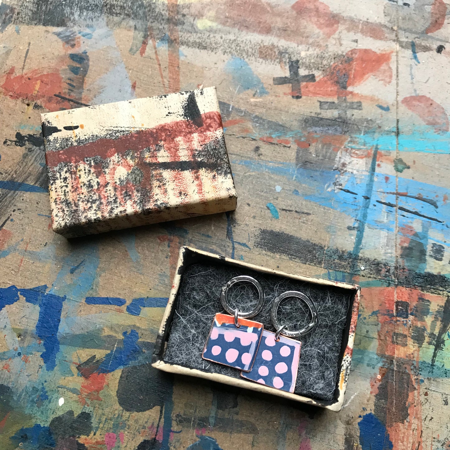 the HURTLING & EMERGENT earrings