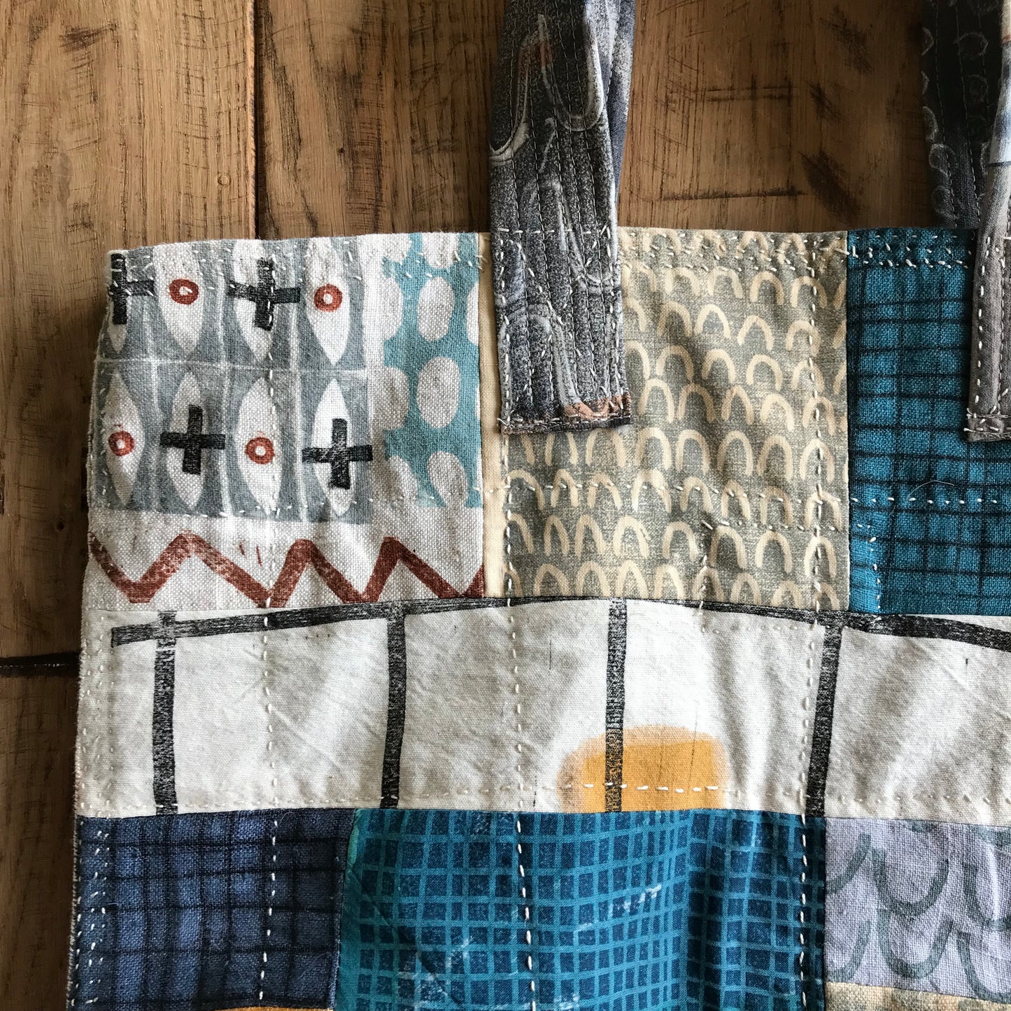 the PATCH WORK GRID WORK bag
