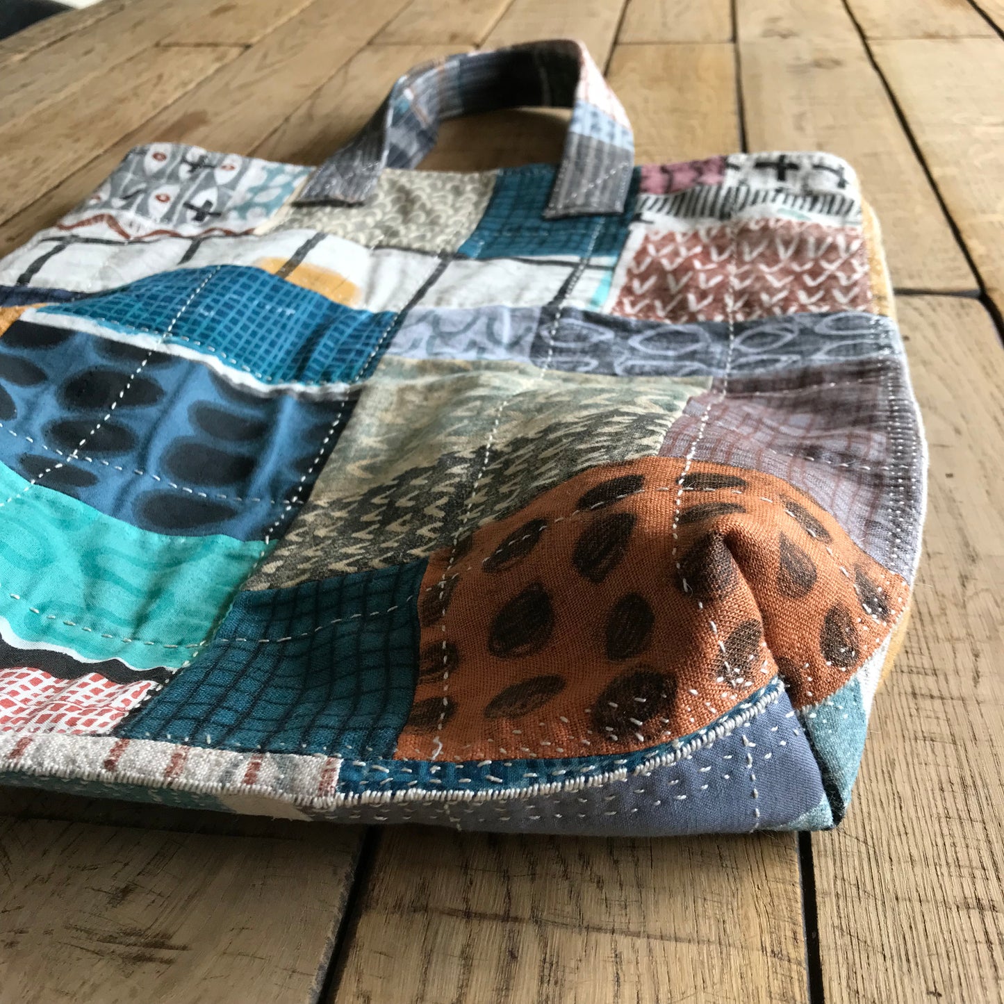 the PATCH WORK GRID WORK bag