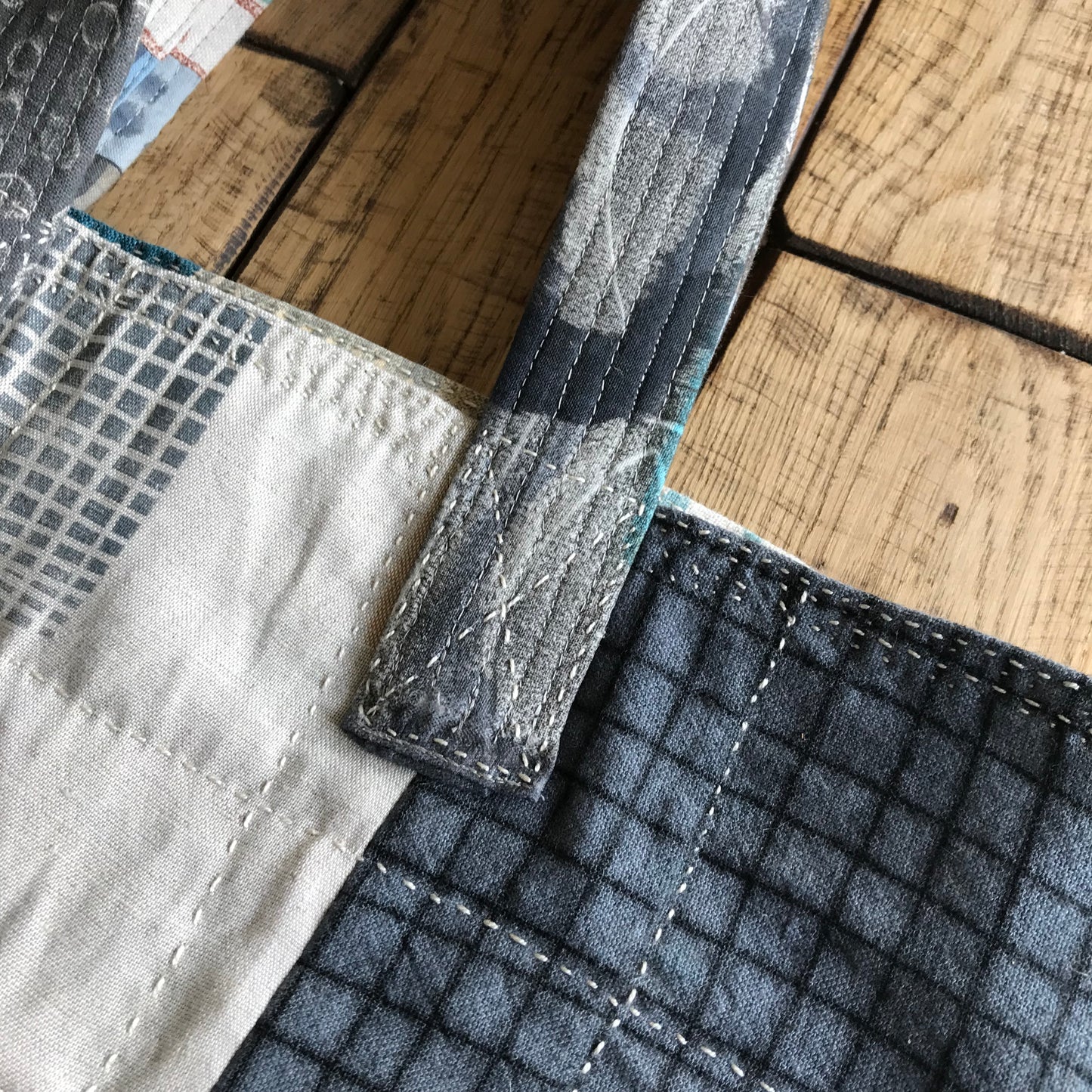 the PATCH WORK GRID WORK bag