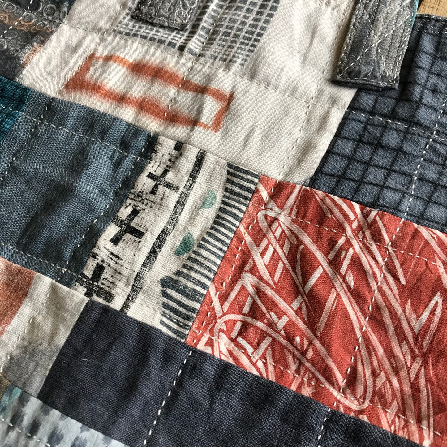 the PATCH WORK GRID WORK bag